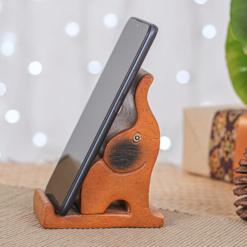 Hand-Carved Happy Elephant Raintree Wood Phone Holder, 'Giant Assistant' Hand-Carved Happy Elephant Raintree Wood Phone Holder, 'Giant Assistant'