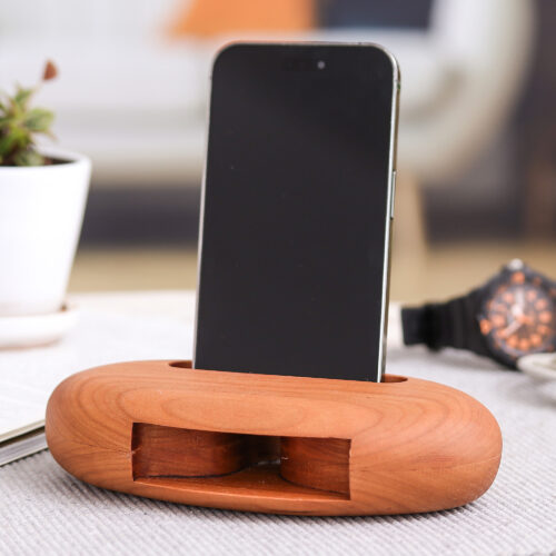 Hand-Carved Minimalist Oval Cherry Wood Phone Speaker, 'Serene Sounds' Hand-Carved Minimalist Oval Cherry Wood Phone Speaker, 'Serene Sounds'