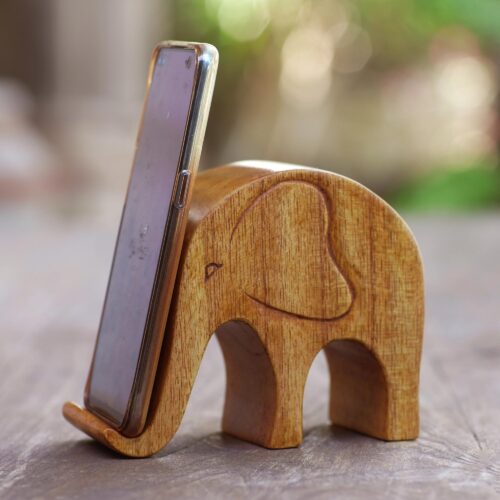 Handmade Jempinis Wood Elephant Phone Stand, 'Dialing Elephant' Handmade Jempinis Wood Elephant Phone Stand, 'Dialing Elephant'