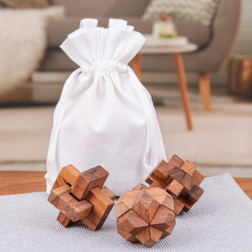 Three Thailand-Made Raintree Wood Puzzles with Storage Pouch, 'Playful Moments' Three Thailand-Made Raintree Wood Puzzles with Storage Pouch, 'Playful Moments'